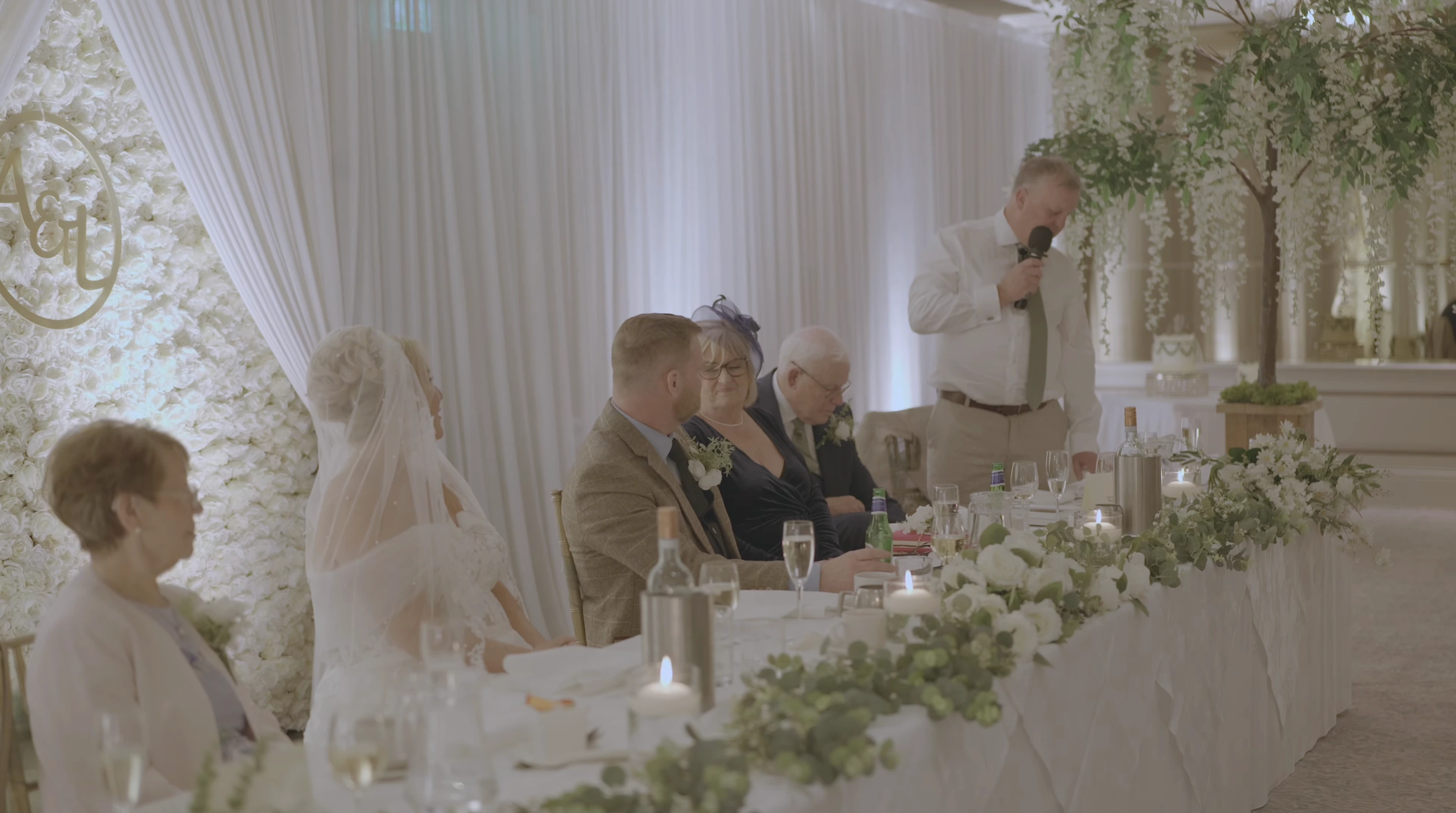 Wedding speech being delivered at the top table during a Grosvenor Pulford wedding in Cheshire
